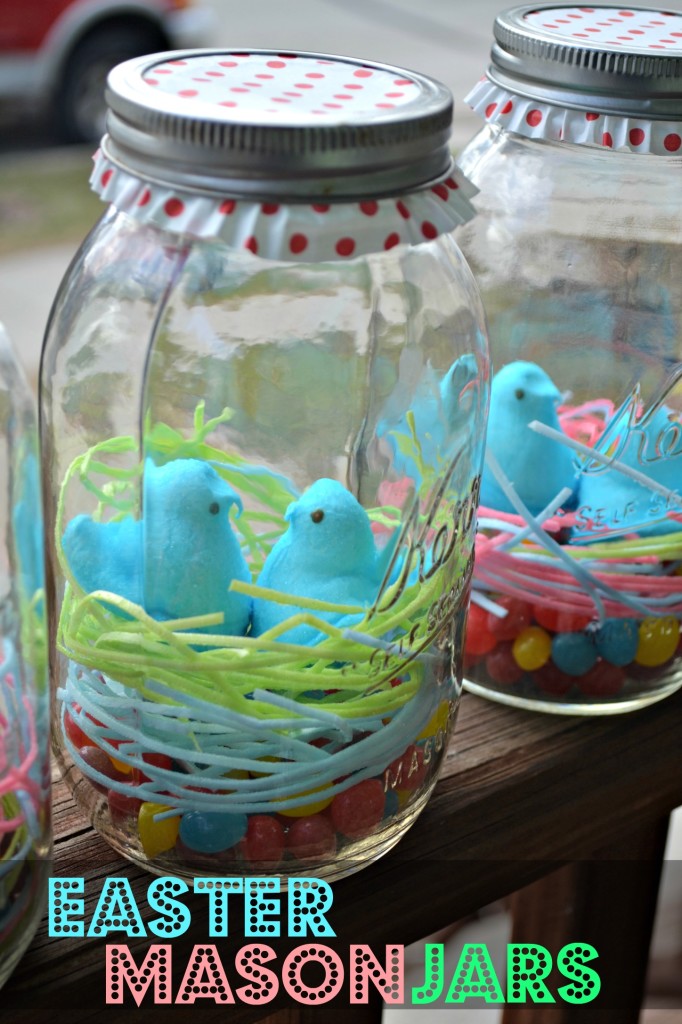 Easter Mason Jars. The perfect last minute Easter craft! Edible Grass, jelly beans, and peeps make a simple mason jar into a special treat. Use a cupcake liner to dress the simple mason jar up! 