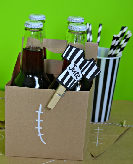 Serve carbonated juice with paper straws at a football party