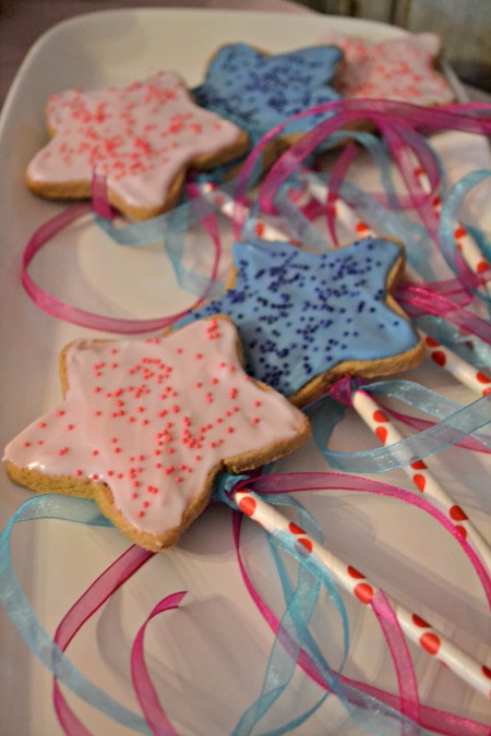 Simple princess party ideas, inspired by Sophia the First. Princess cookie wands with paper straws and ribbon.