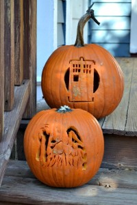 tardis and weeping angel pumpkins on the front porch steps