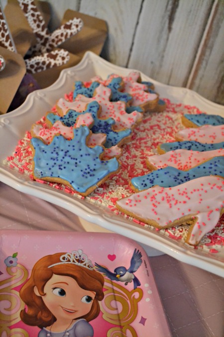 Simple princess party ideas, inspired by Sophia the First. Princess cookies served on a pretty cake plate.