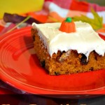 easy pumpkin bars plated with a pumpkin candy on top